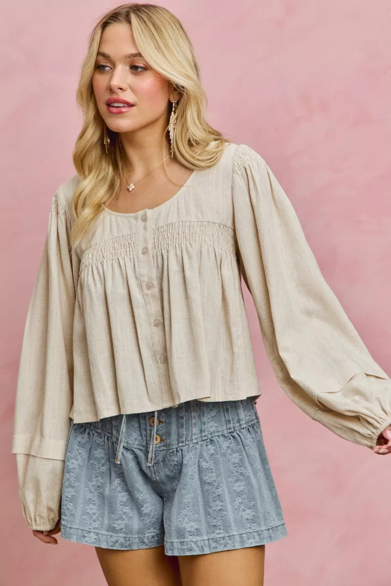 Cream linen blend smocked long sleeve top, detail view