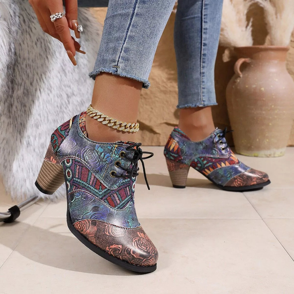 Lace up block heel ankle boots worn on model