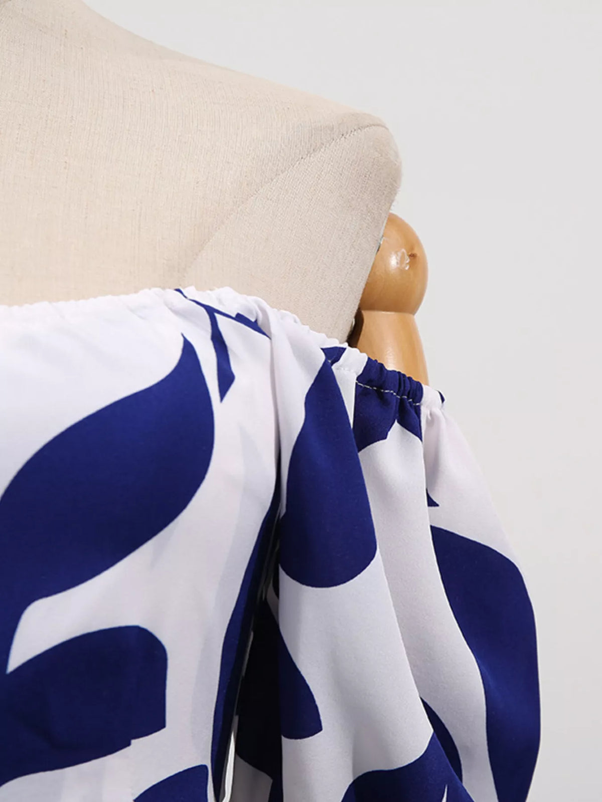 Off shoulder leaf print smocked maxi dress, close styled view