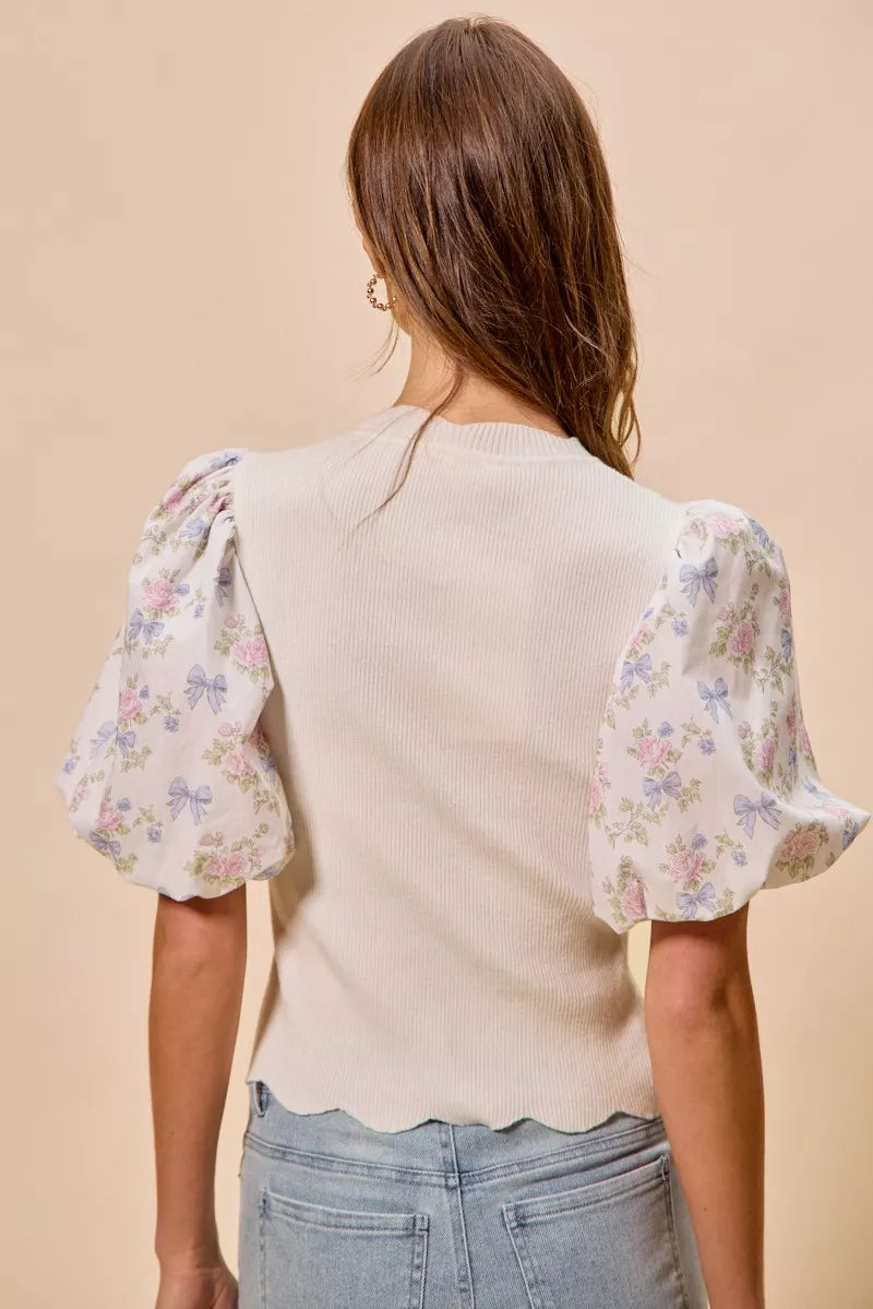 Scalloped trim floral sweater top side view