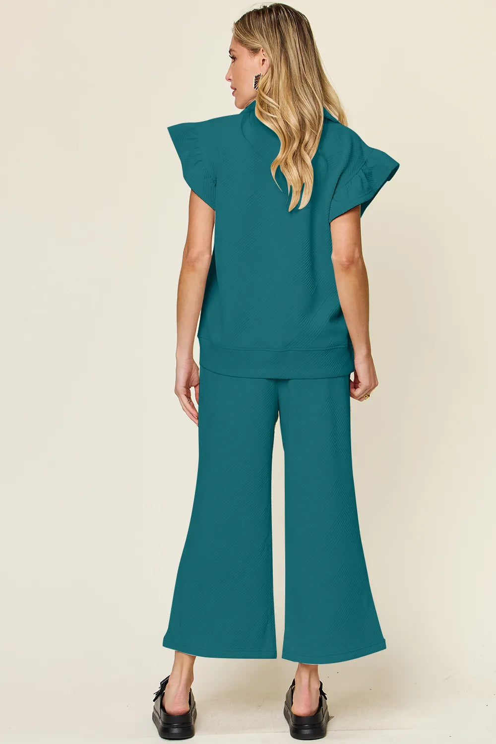 Alternate angle of the womens ruffle set