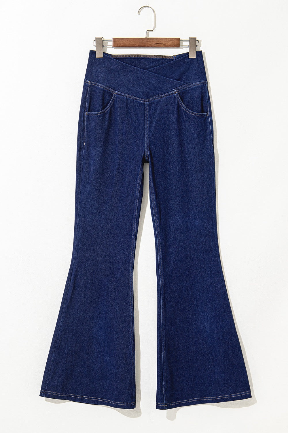 Flare hem detail on dark navy jeans