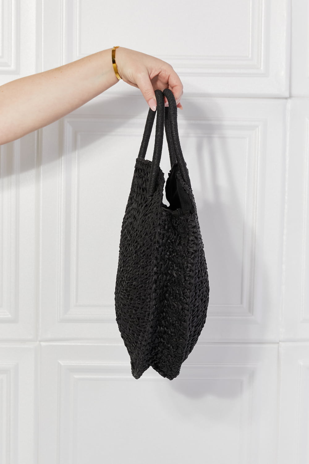 Woven straw handbag styled with a summer outfit