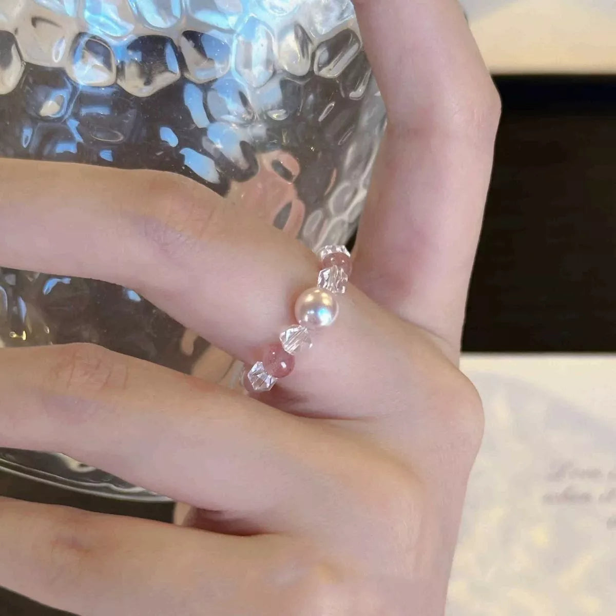 Pearl and crystal bead ring close up