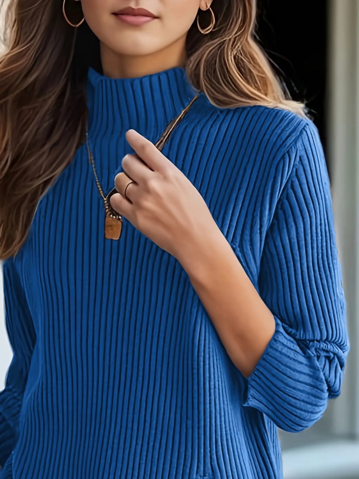 Blue ribbed turtleneck sweater back view