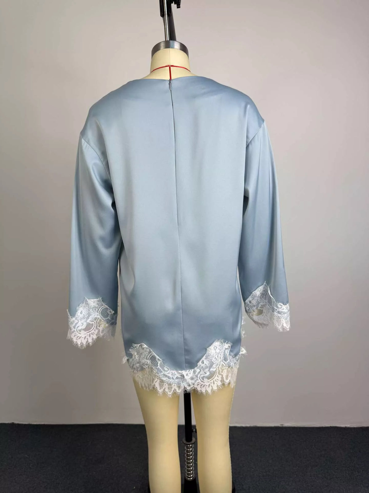 Light blue satin top styled with denim