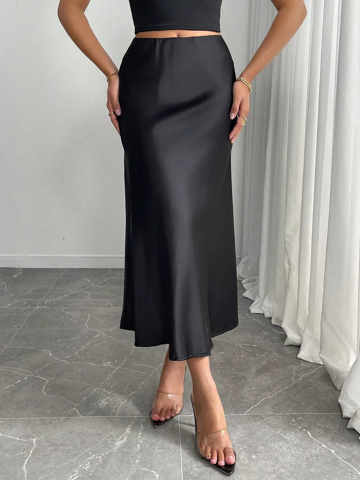 Satin midi skirt front view on model
