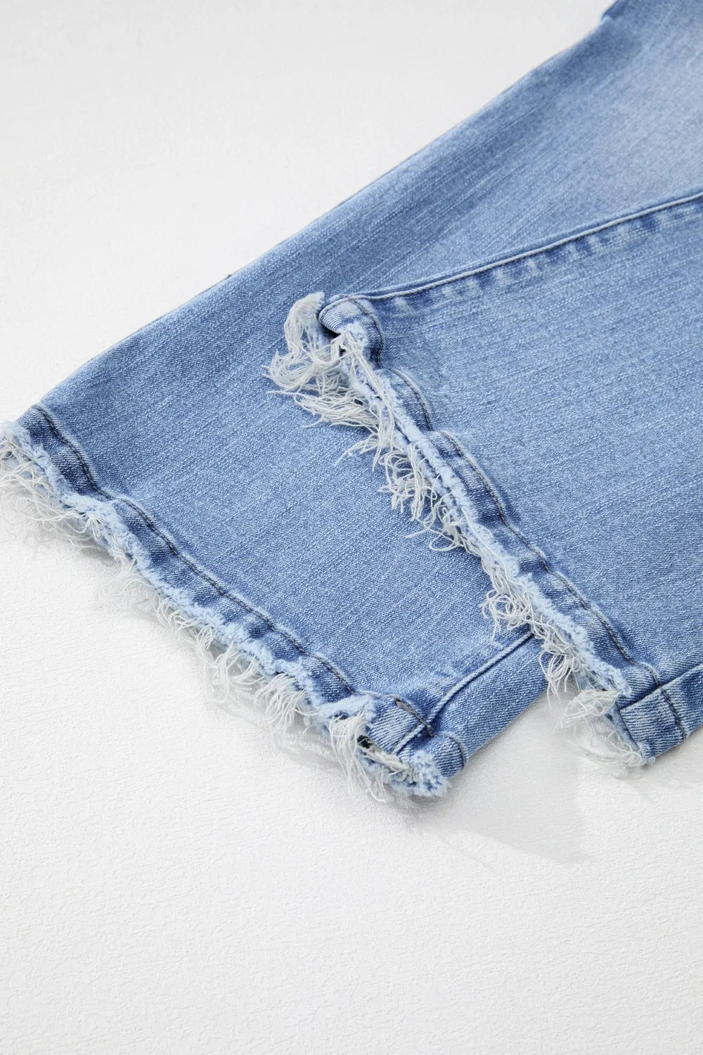 Back detail of mineral wash flare jeans