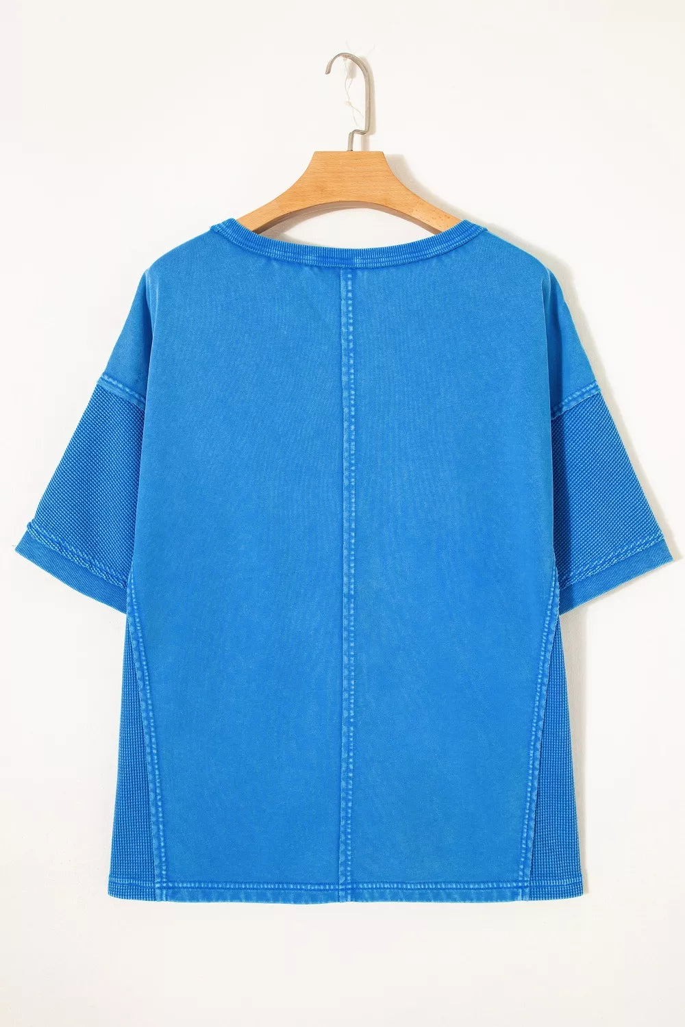 Blue mineral wash star patchwork oversize tee fabric detail