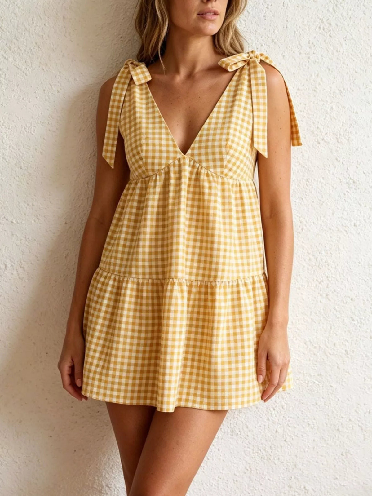 Yellow gingham tie shoulder mini dress front view