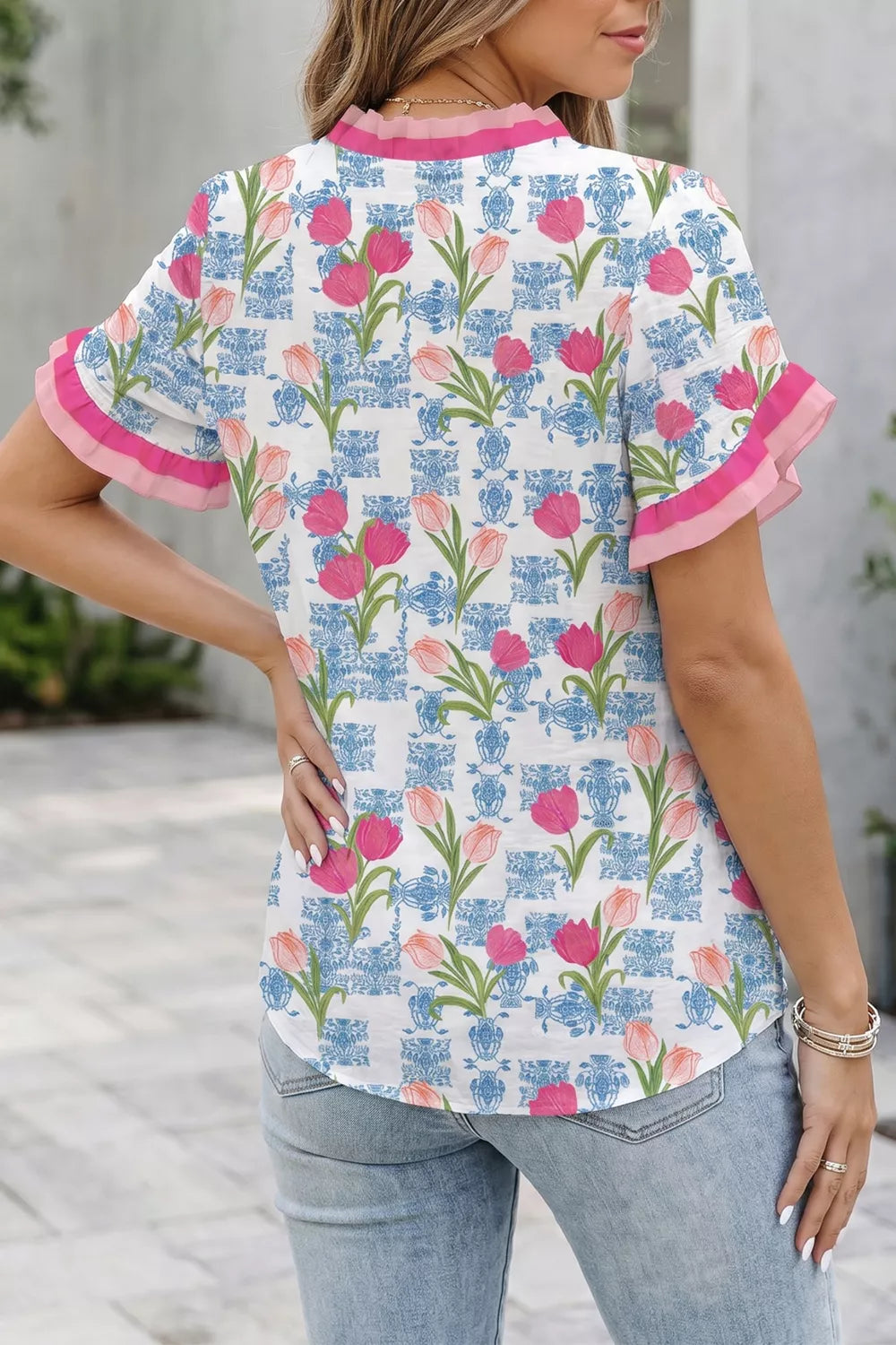 Dusty pink floral ruffle V neck short sleeve tunic front view