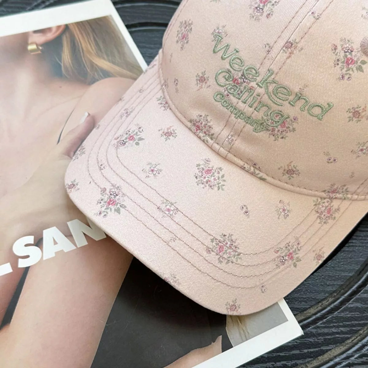Floral baseball cap shown in an alternate colourway