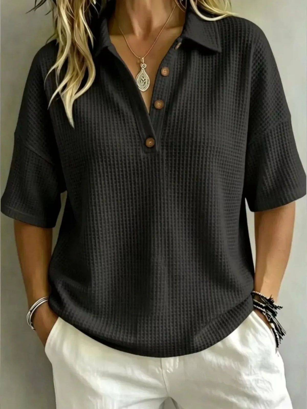 Waffle knit polo top styled in a soft pastel colour