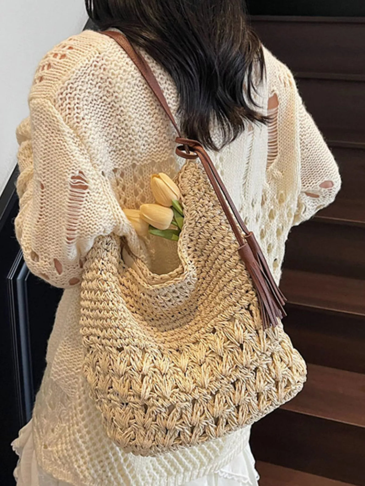 Interior view of woven straw shoulder bag