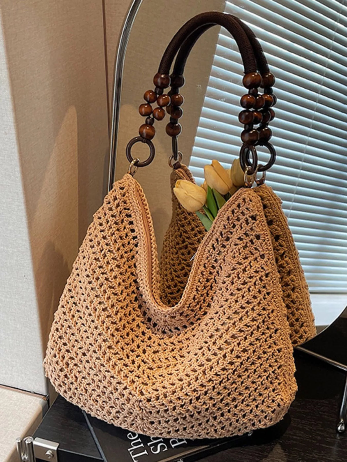 Model carrying knitted bead handle shoulder bag