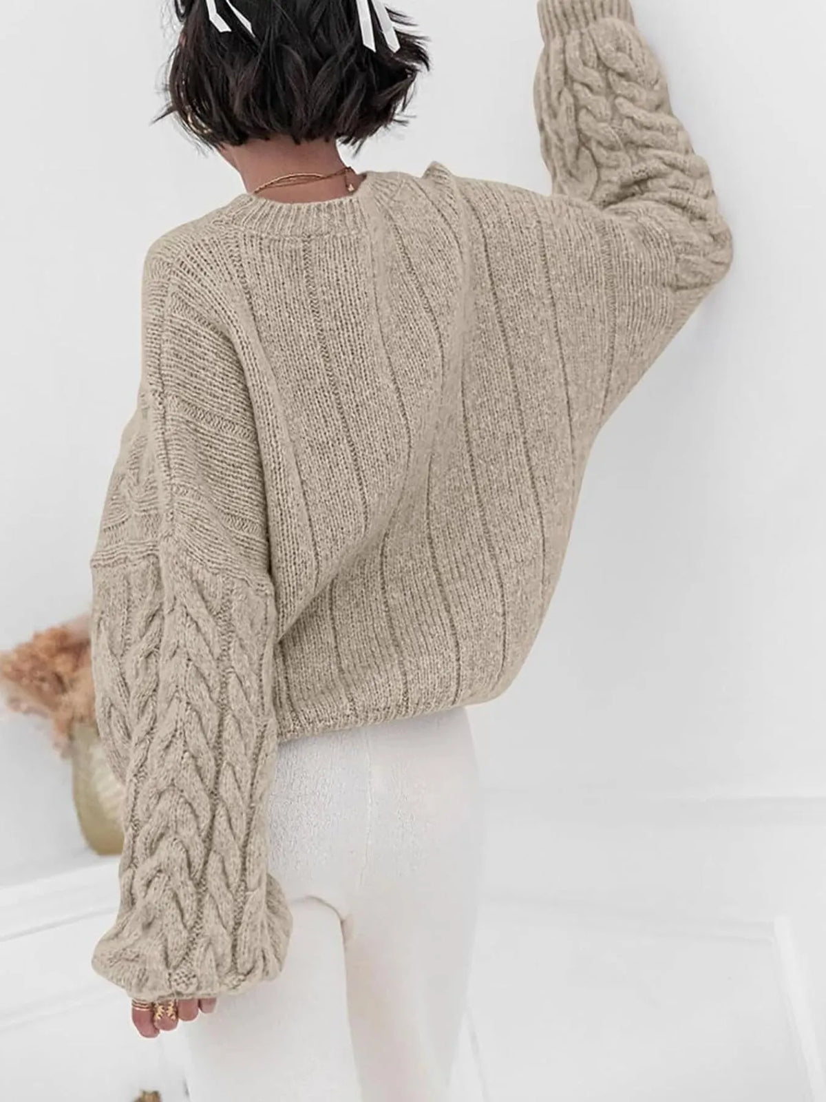 cable knit long sleeve sweater side view
