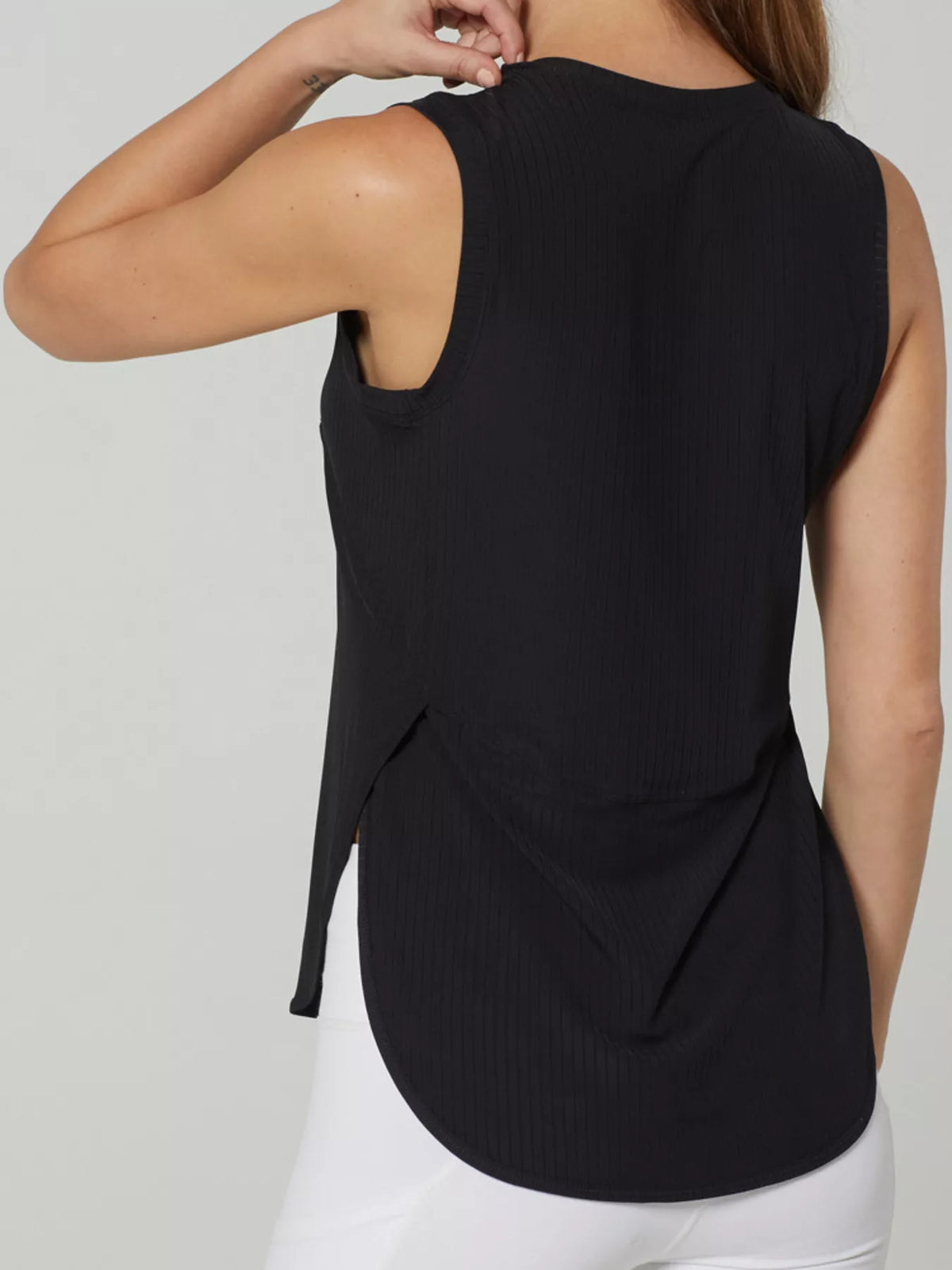 Tank hem and slit shown from the front