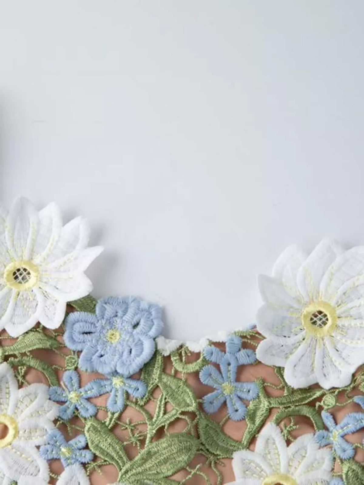 Floral embroidered dress side view