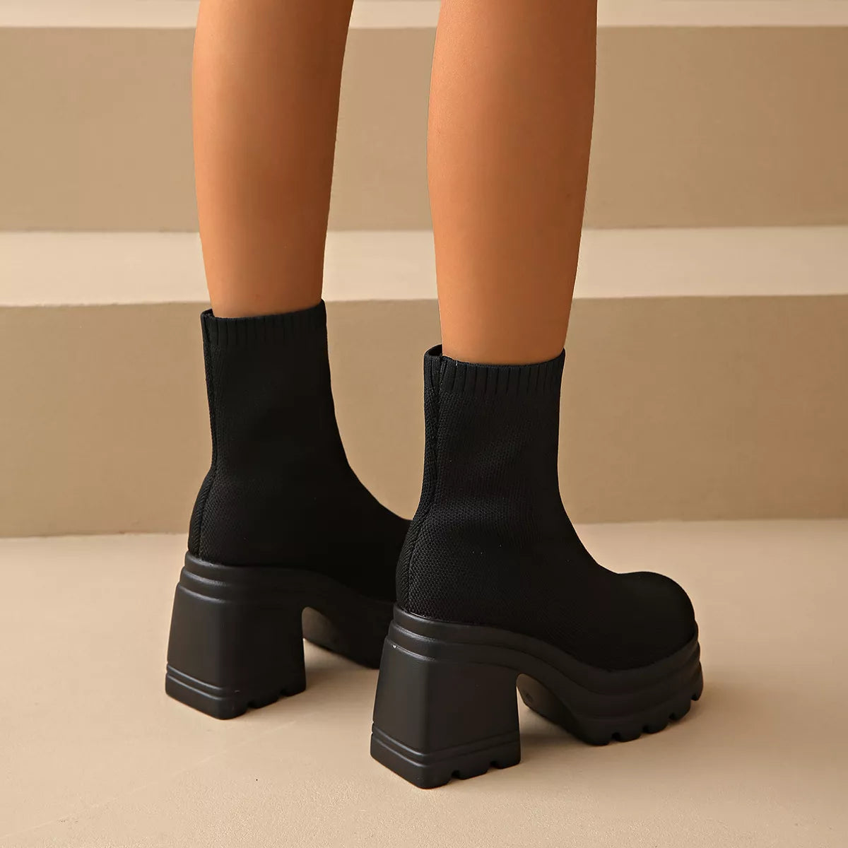 Round toe block heel boots styled on model