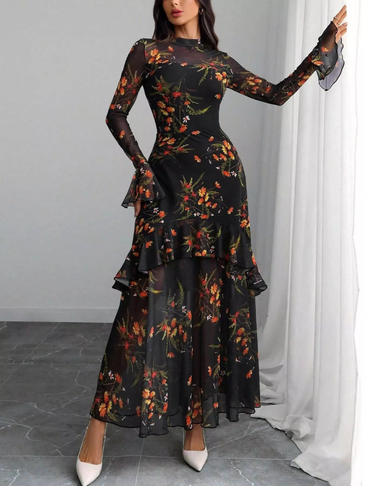 Floral flounce sleeve mermaid maxi dress, styled on model