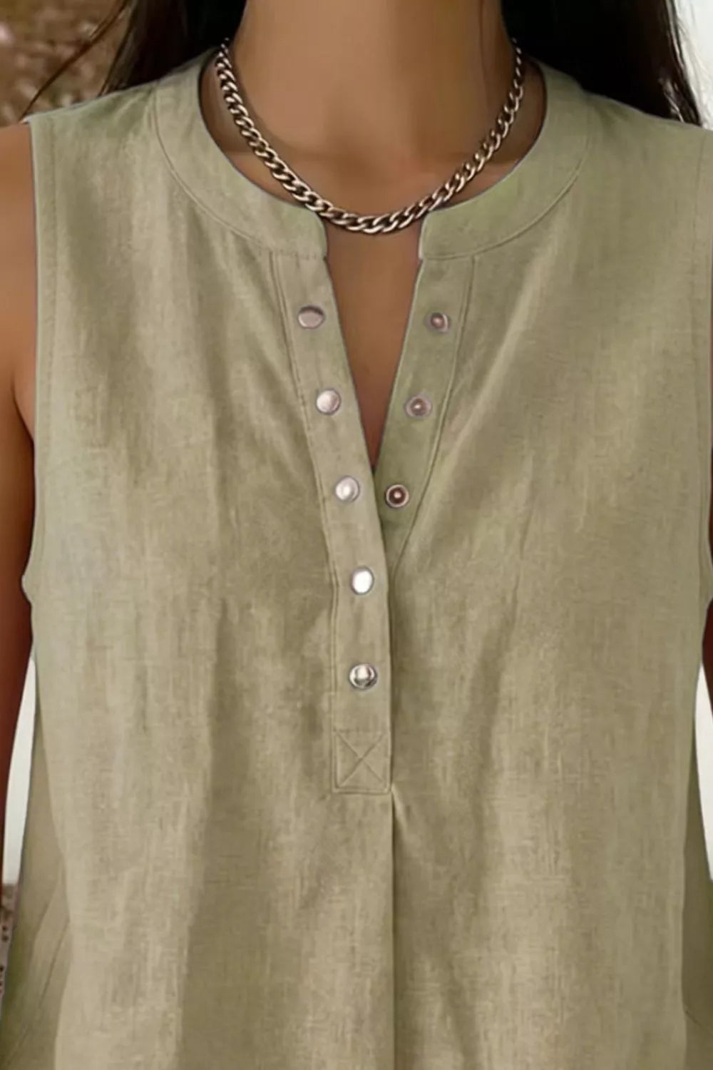 Back view of sleeveless snap down top