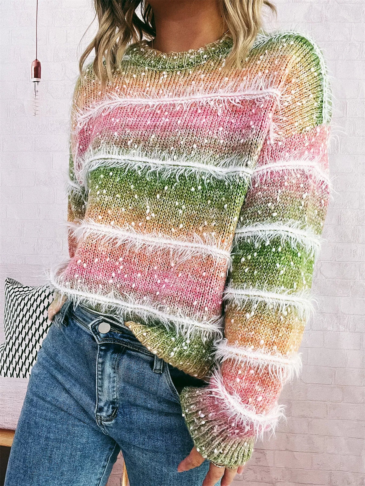 gradient striped round neck sweater close up of the neckline