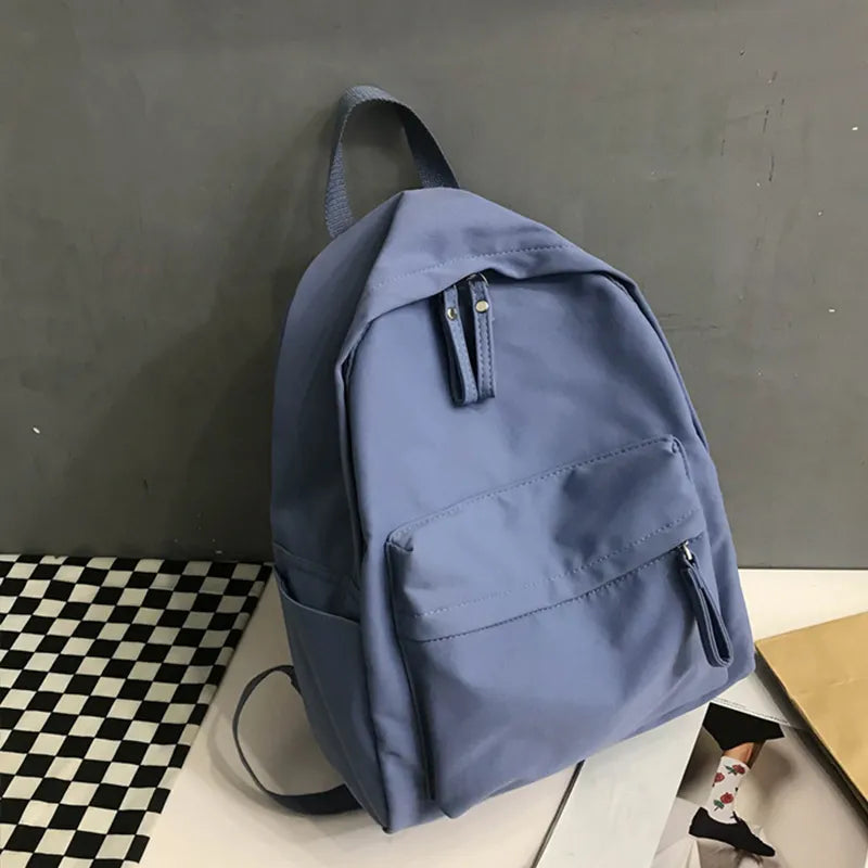 Cotton zip top backpack base and stitching detail