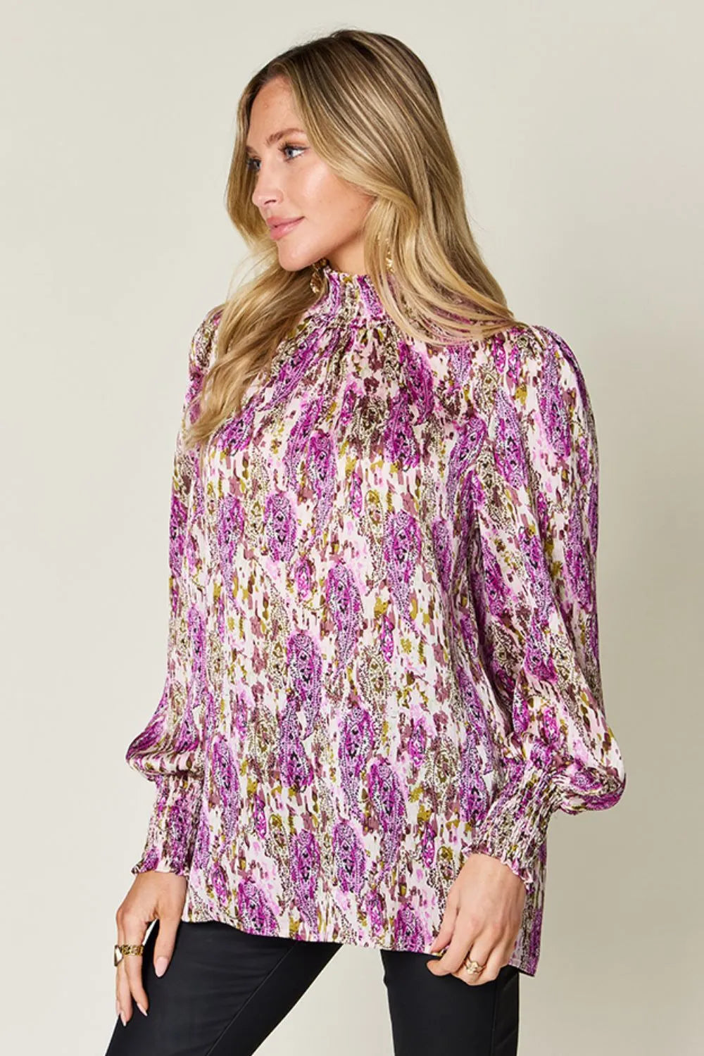Blouse shown untucked over jeans