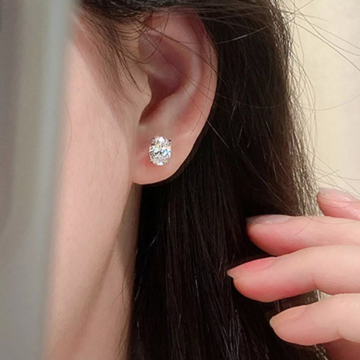 1 carat moissanite stud earrings in sterling silver