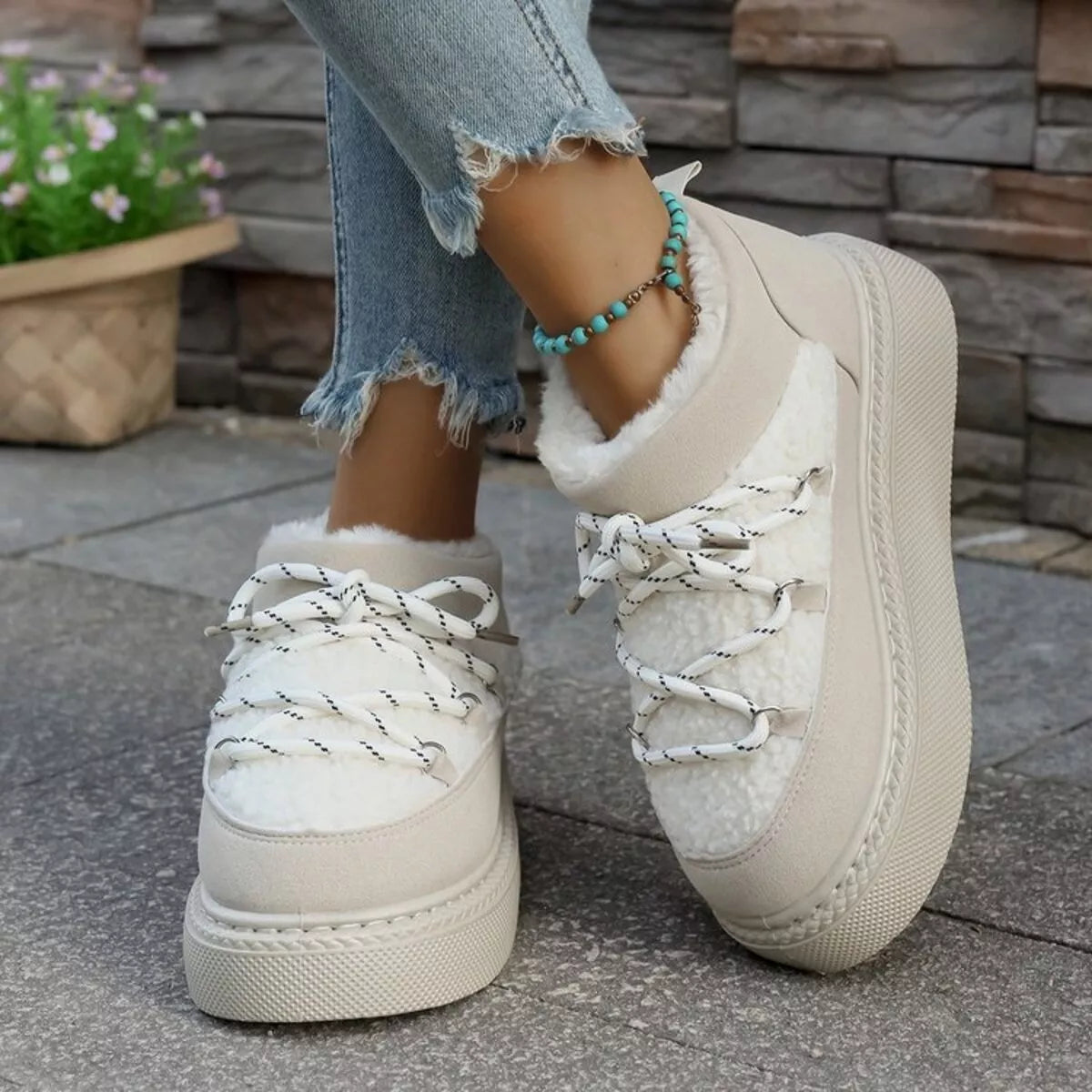 plush lined lace up platform winter boots worn with denim