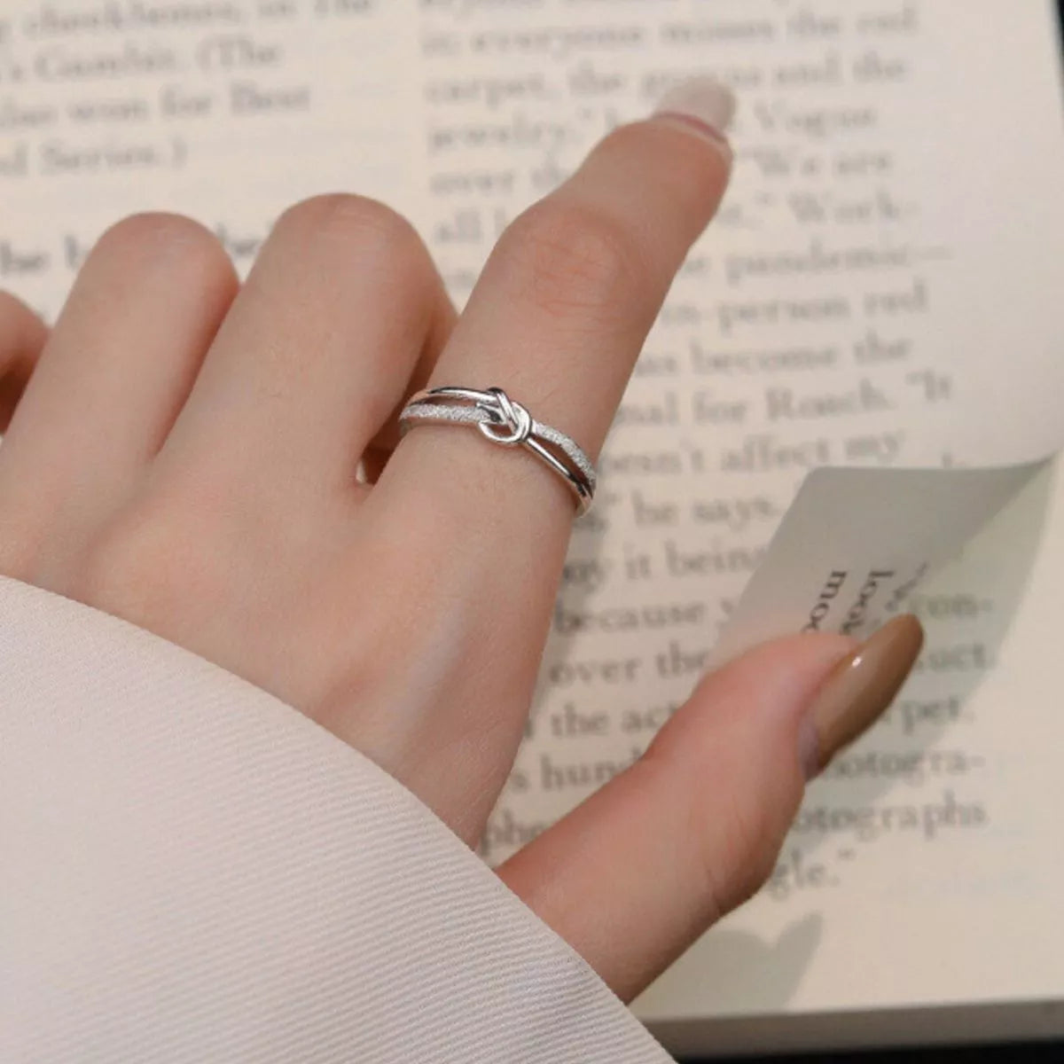 Sterling silver zircon knot ring close up view