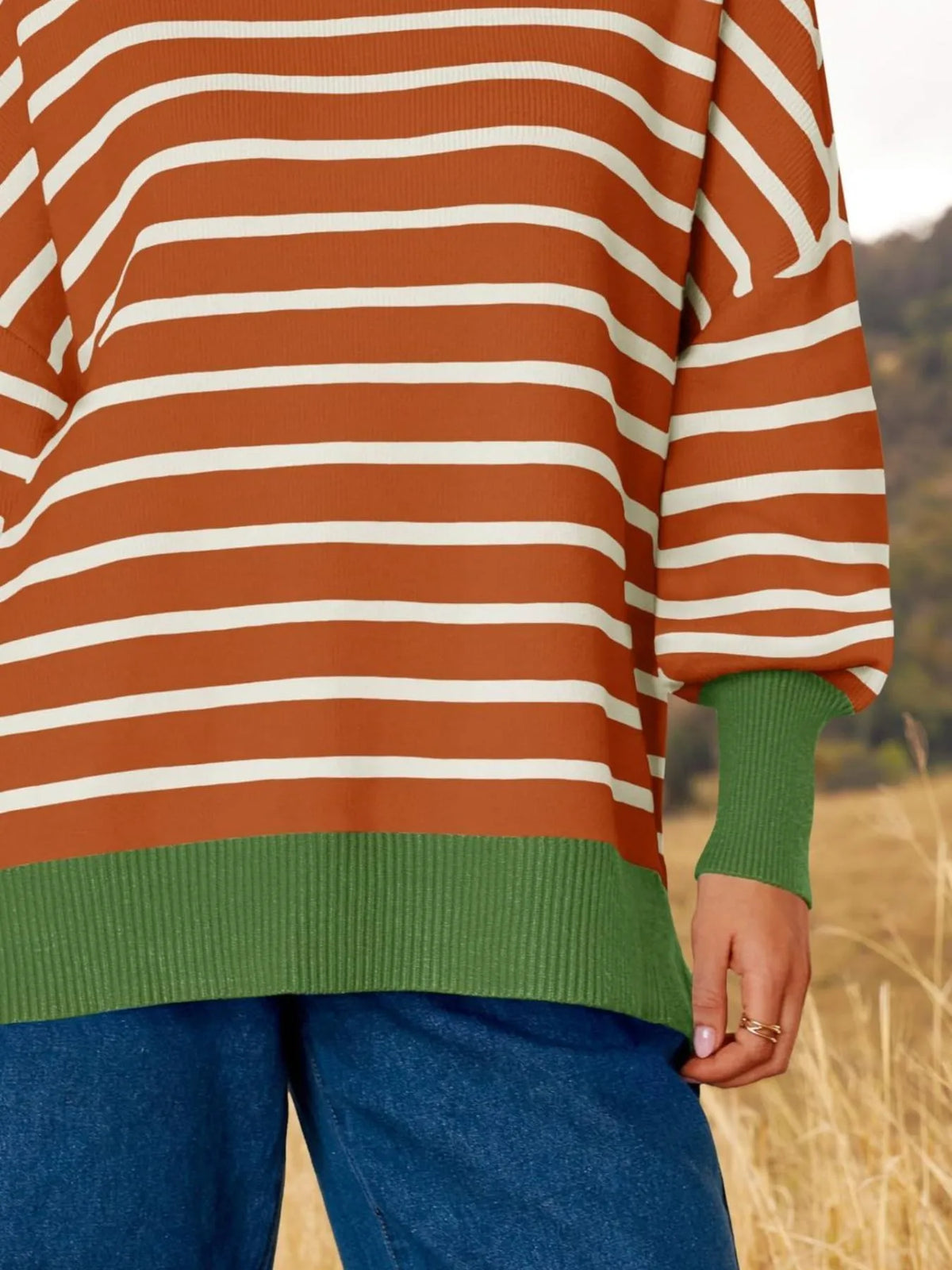 Striped sweater shown in an alternate color
