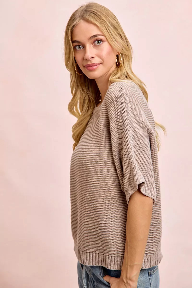 Washed knit dolman top fabric detail
