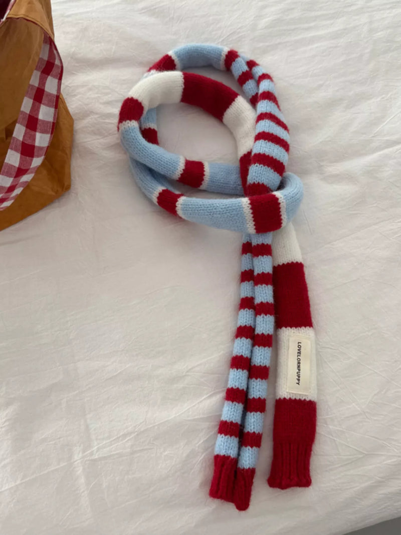 Striped knitted warm scarf wrapped around the neck