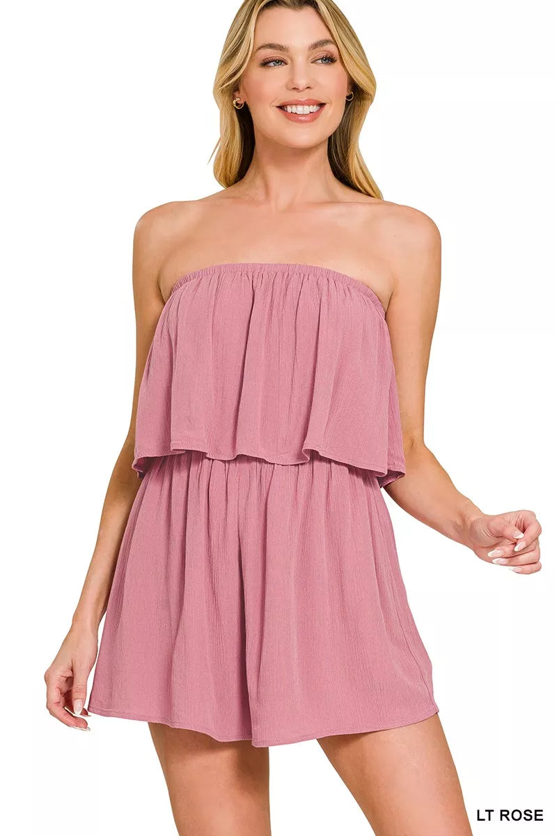 Model wearing the Zenana woven crinkle strapless romper in a front view