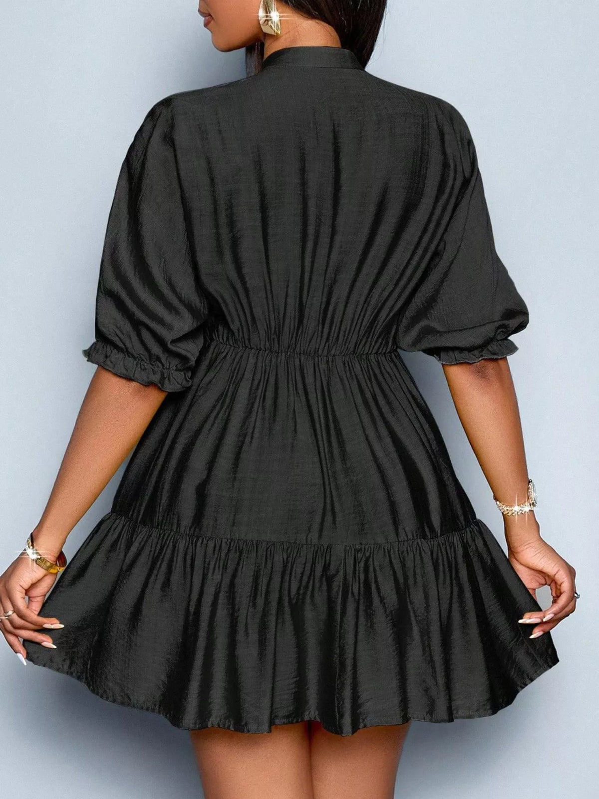Full length view of notched neck tiered dress