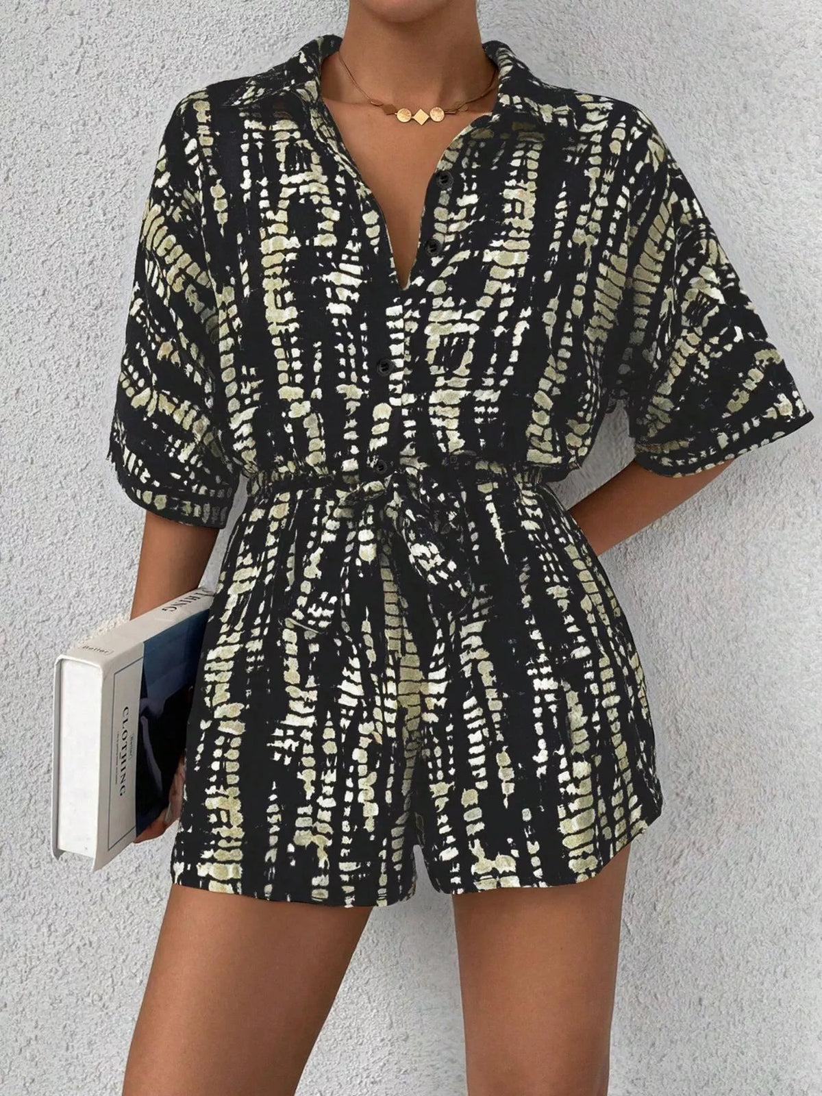 Striped button up romper full length view