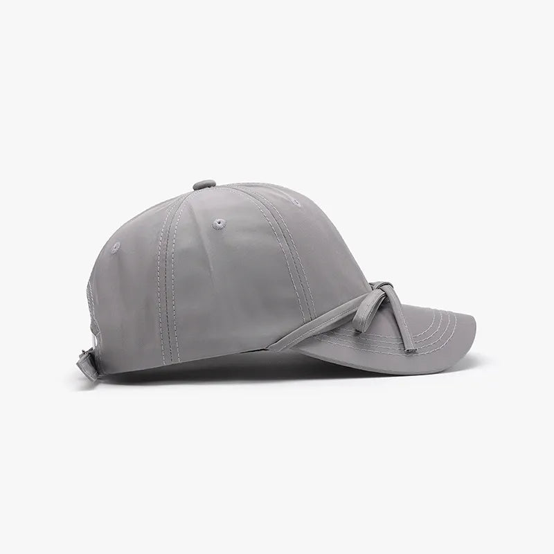 Cotton baseball cap side profile showing structured brim