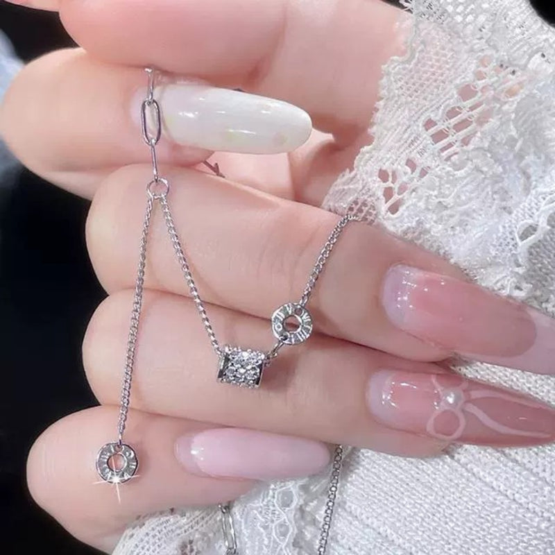 Sterling silver pendant necklace worn at the collarbone