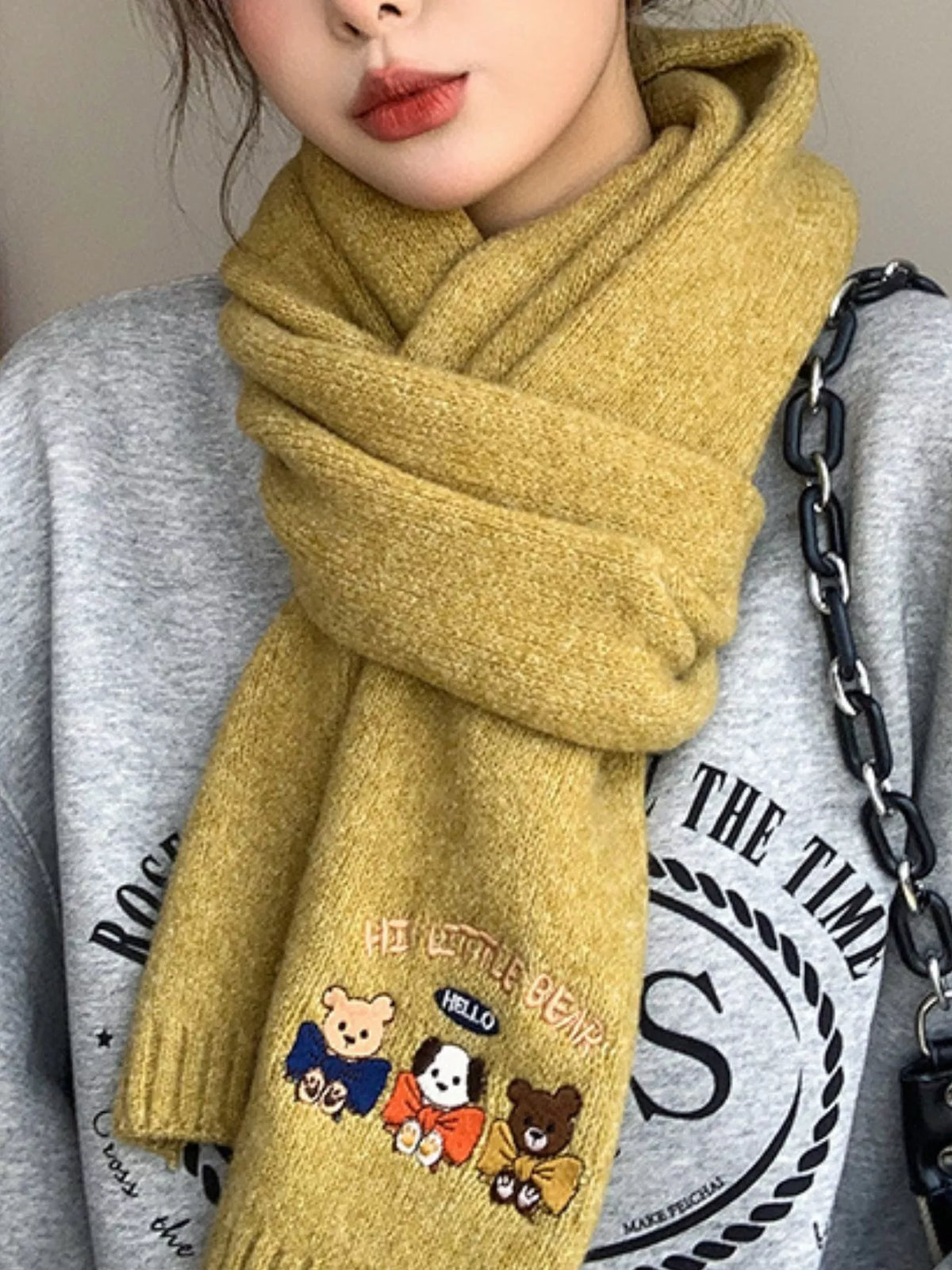 Detail of the soft acrylic knit on the cartoon scarf