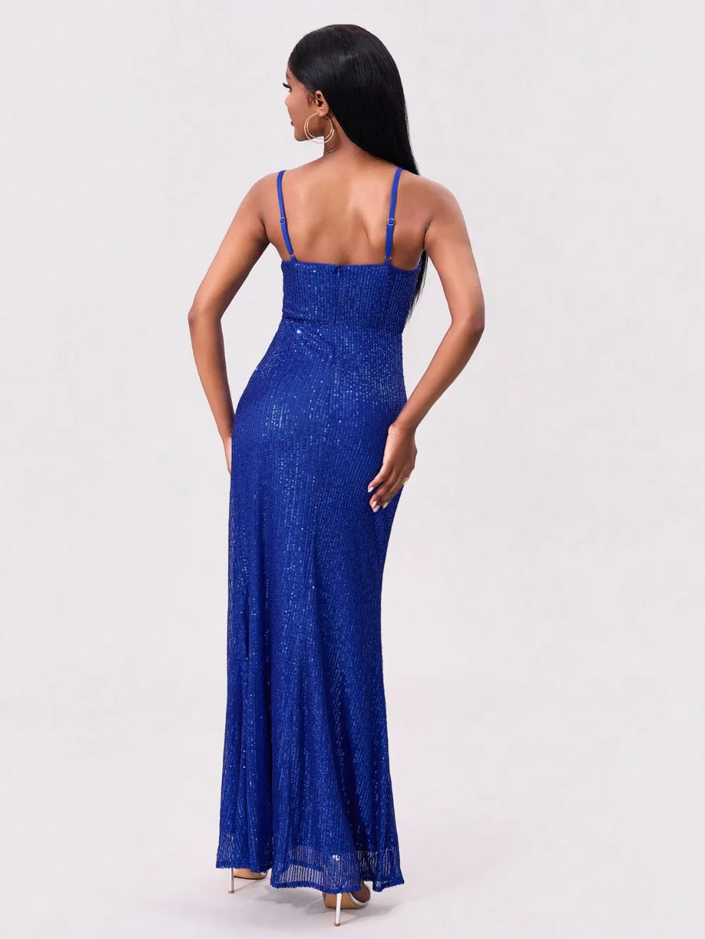 Sequin maxi dress angled view showing leg slit