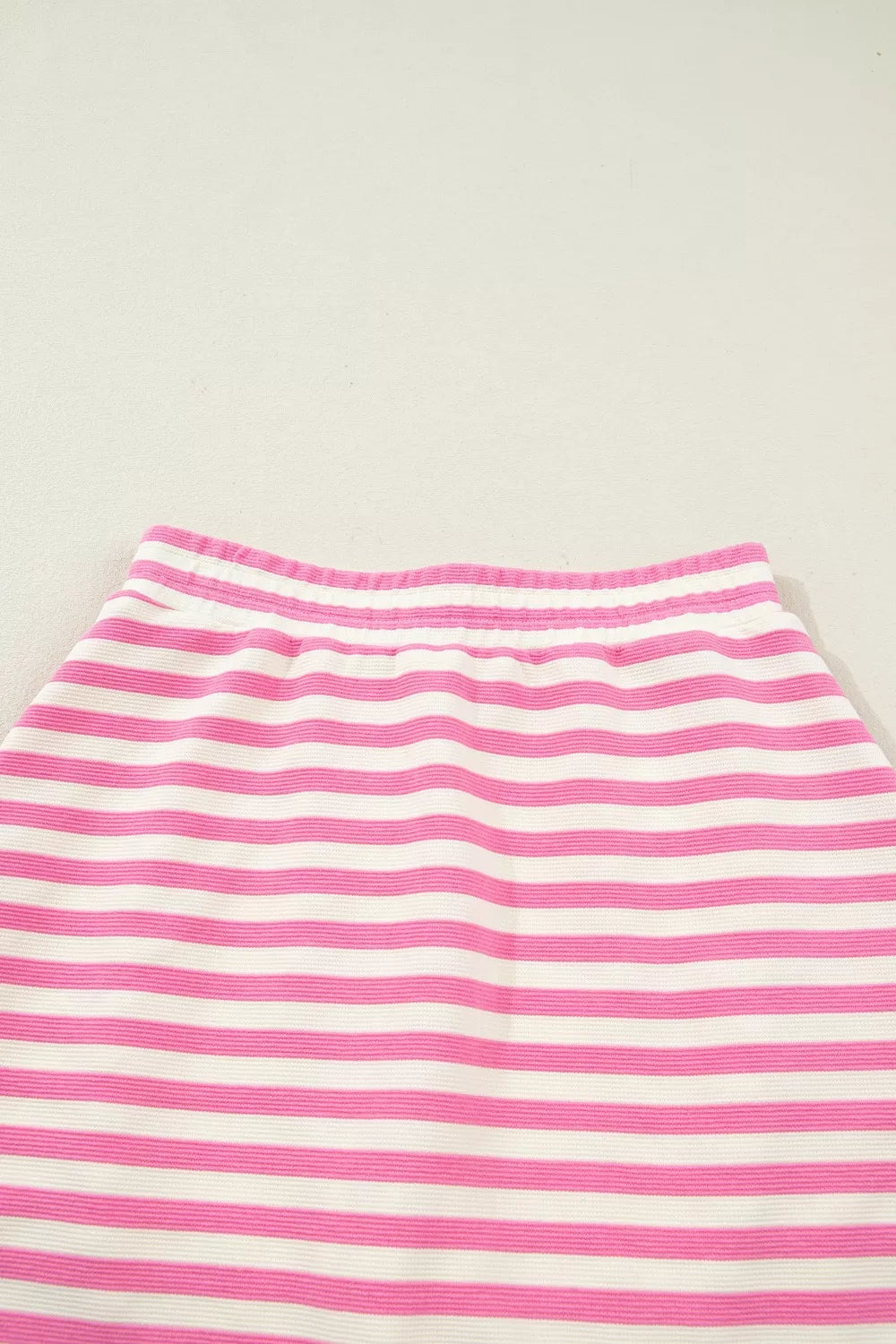 Striped sleeveless top and skirt set styled