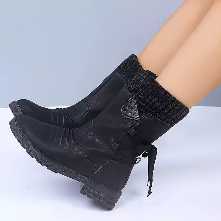 Black knitted cuff round toe boots side profile view