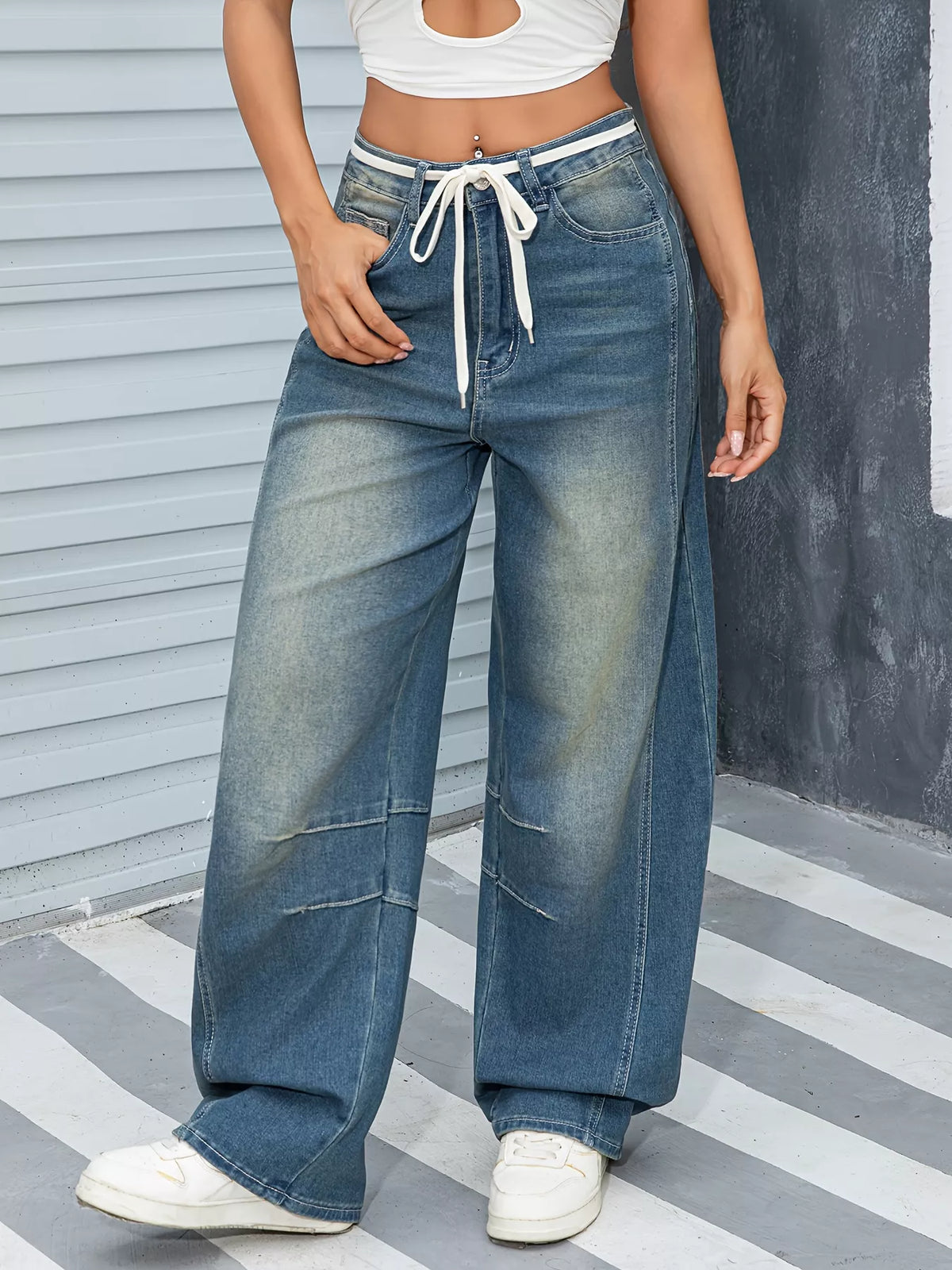 Wide leg jeans showing faded vintage wash