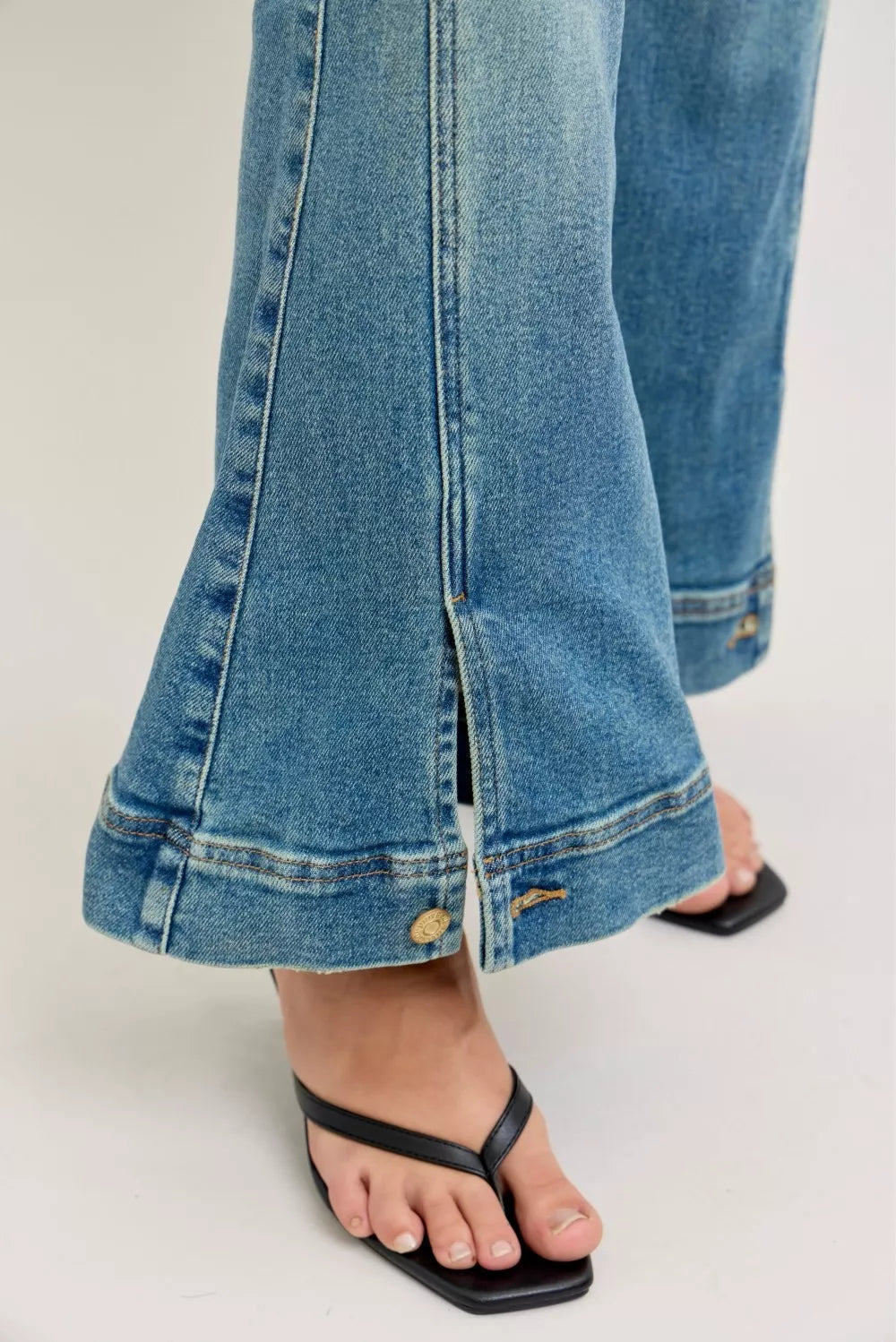 Judy Blue medium wash flare jeans full length view