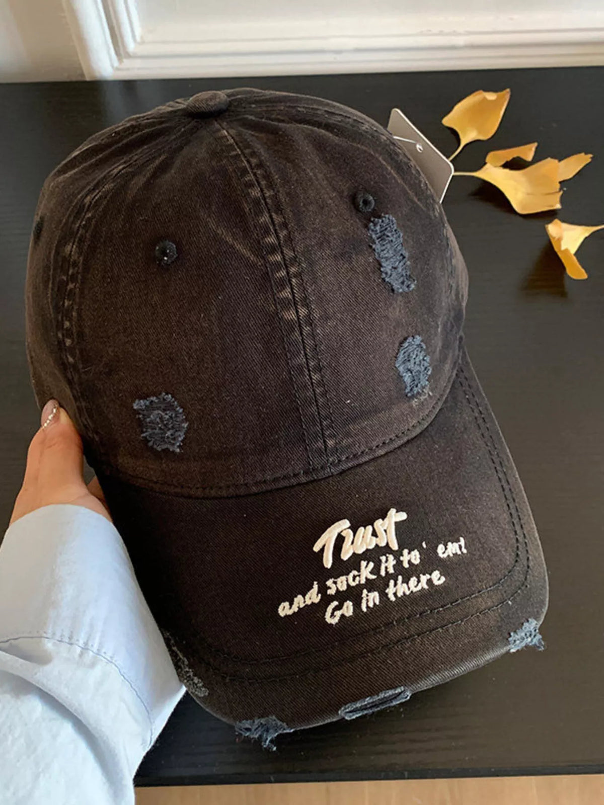 Cotton baseball cap shown in a light beige colourway