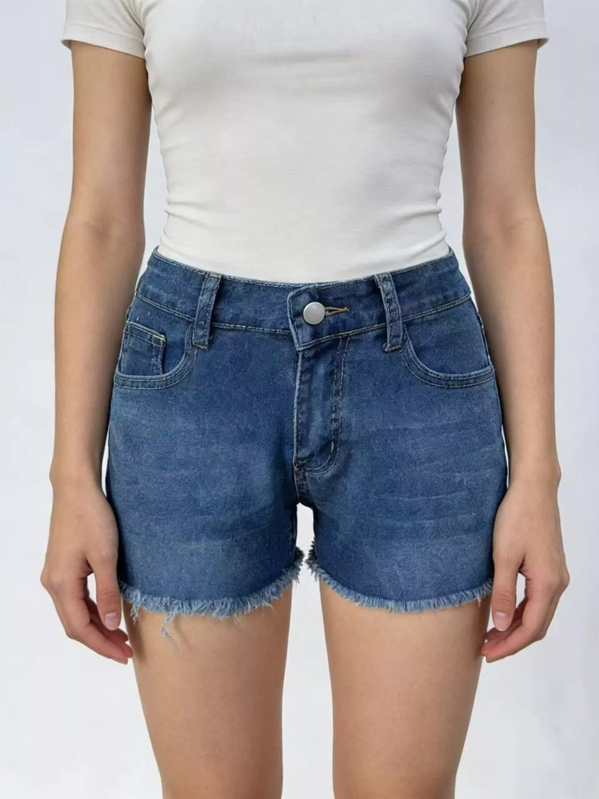 Dark blue denim shorts side profile view