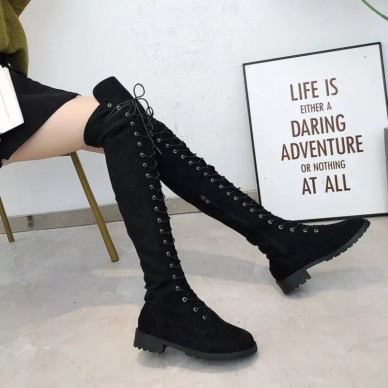 Lace up over the knee boots toe close up