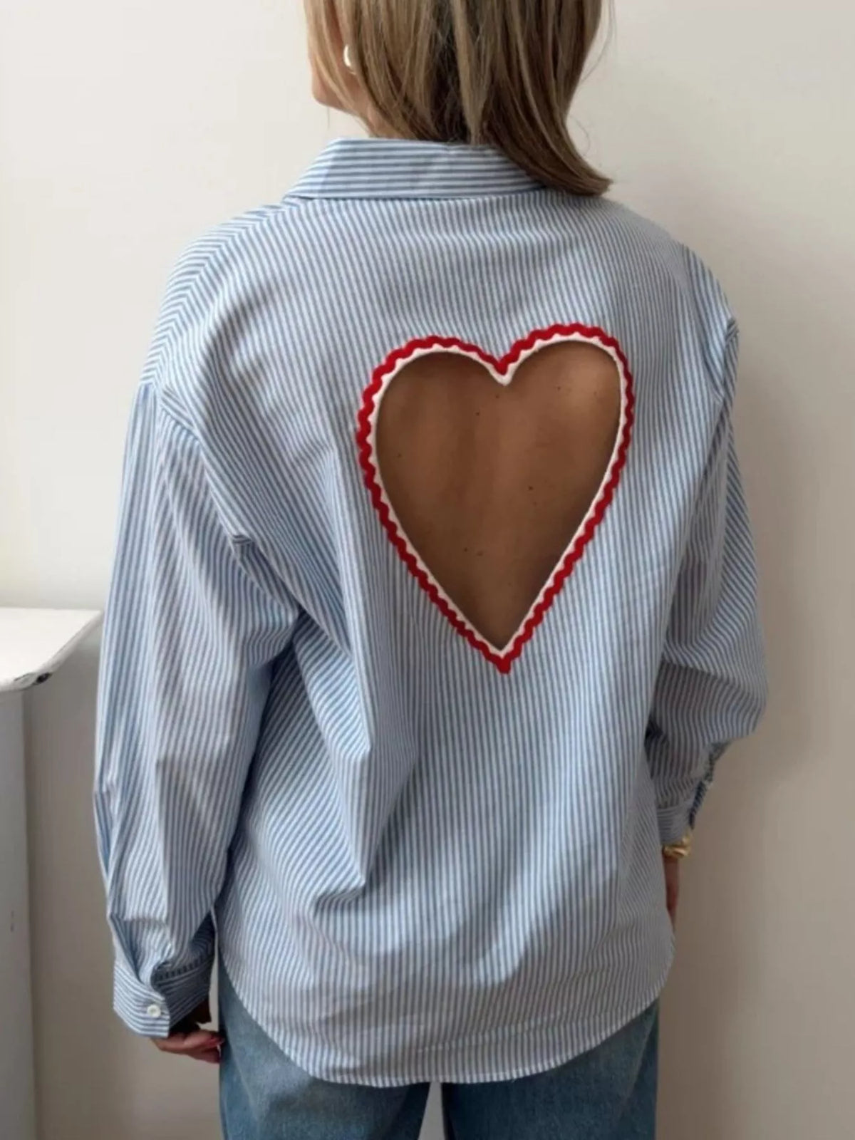 Classic striped button down shirt styled on model