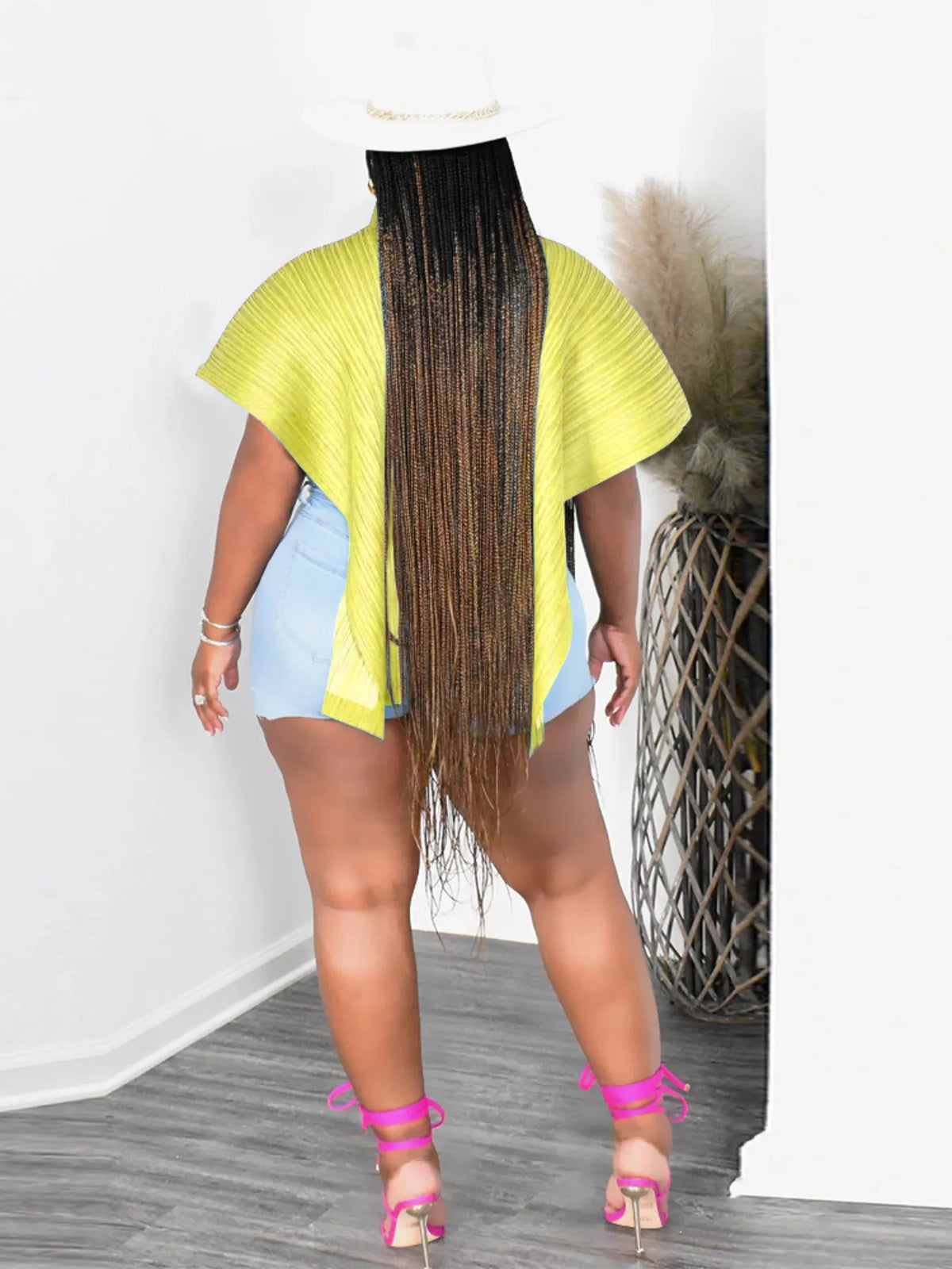 Yellow turtleneck cape top side view